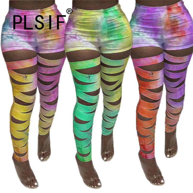 Простые однотонные облегающие брюки с отверстиями специального дизайна