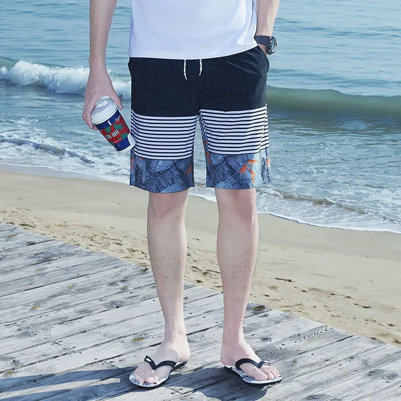 

2021Shorts men's summer casual five-point large trunks trendy swimming trunks loose quick-drying beach pants hot spring pants