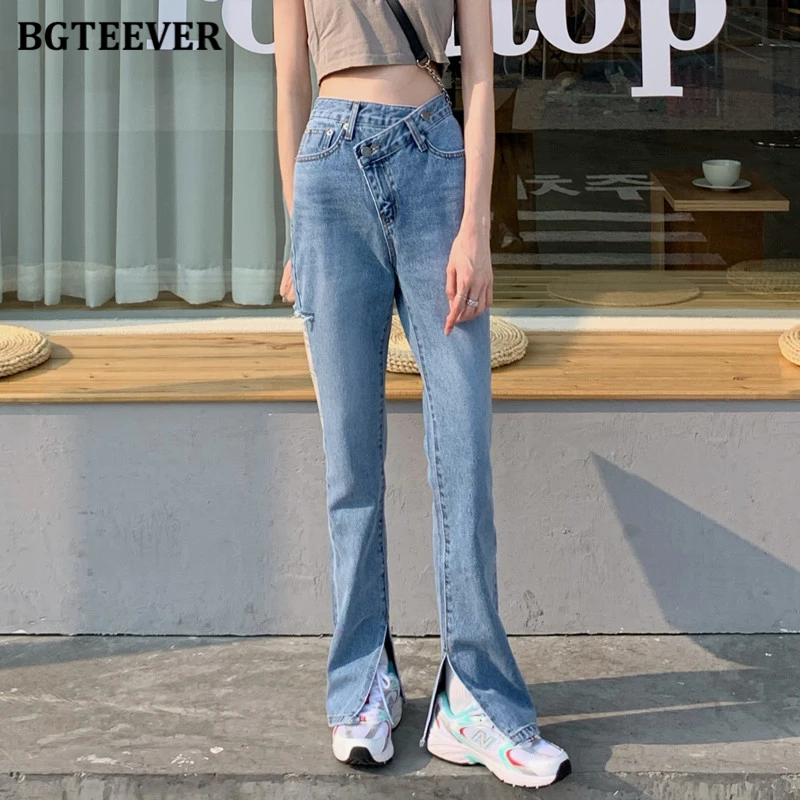 

BGTEEVER Stylish Chic High Waist Inclined Button Women Flare Jeans Pants Casual Loose Ripped Holes Ladies Split Denim Trousers