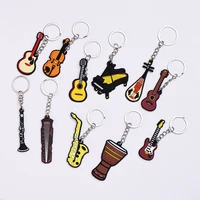 musical instrument piano guitar violin saxophone clarinet djembe ukulele silicone keychain pendant