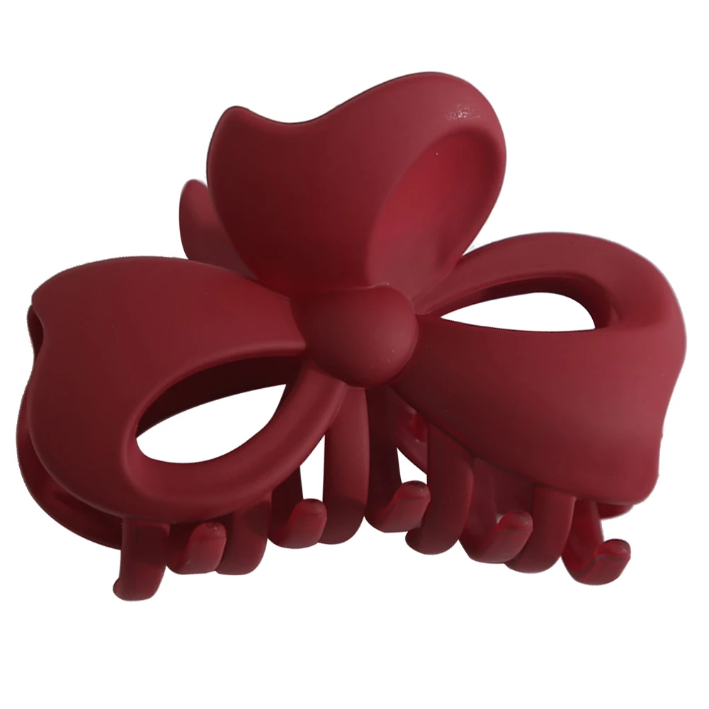 Заколка-зажим для волос в виде банта карамельного цвета |