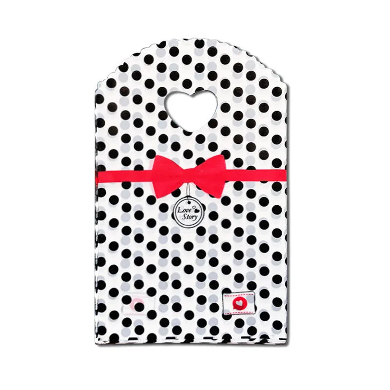 

50pcs/lot Various Patterns Jewelry Plastic Bag Heart-Shaped Oval Handles Mini Gift Packing Bag Store Small Shopping Bags