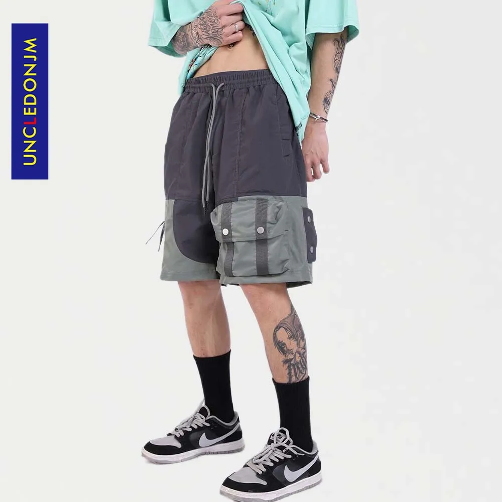 

UNCLEDONJM Colour block pocket shorts men high street streetwear pants mens shorts techwear summer punk pants men shorts 8770