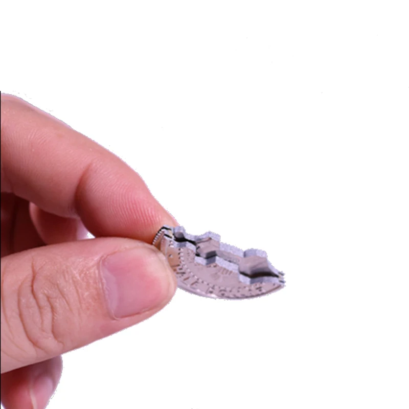 Два складных искусственных элемента и восстановленная монета искусственная для