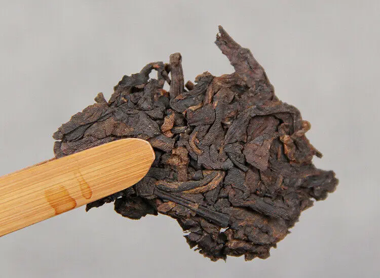 

2018 Year Yun Nan Peacock Tea Cake Ripe Pu-erh 357g Ancient Mt. Old Tree