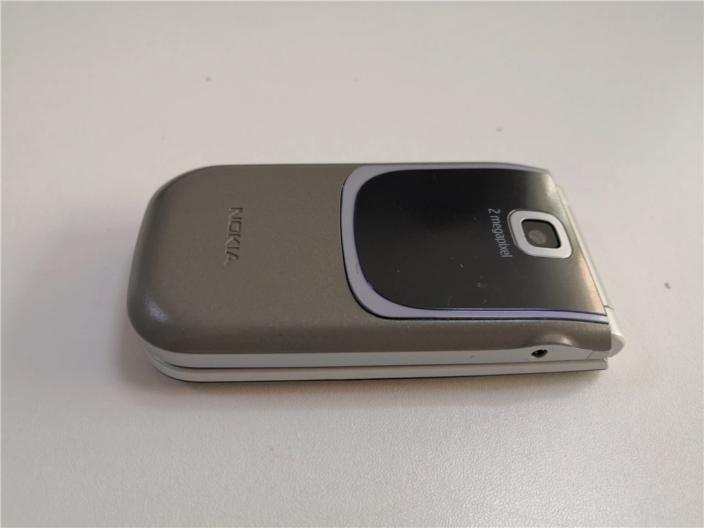 7020 разблокированный сотовый телефон Nokia 7020 Bluetooth 2MP камера MP4 плеер с английской клавиатурой мобильный телефон