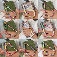 2021 new summer colorful soft clay mobile phone chain lanyards for women bohemia smile pearl rope for phone case hanging cord