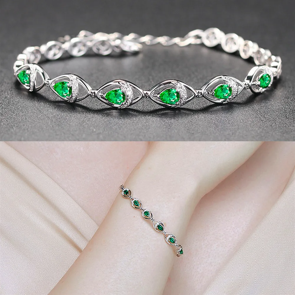 Женский винтажный браслет с зелеными кристаллами и изумрудами золотистый