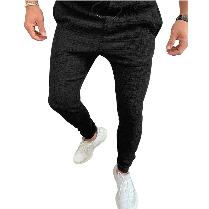 

Spring/summer 2021 men's new hip-hop all-match solid color micro-pull rope mid-waist pocket casual pants