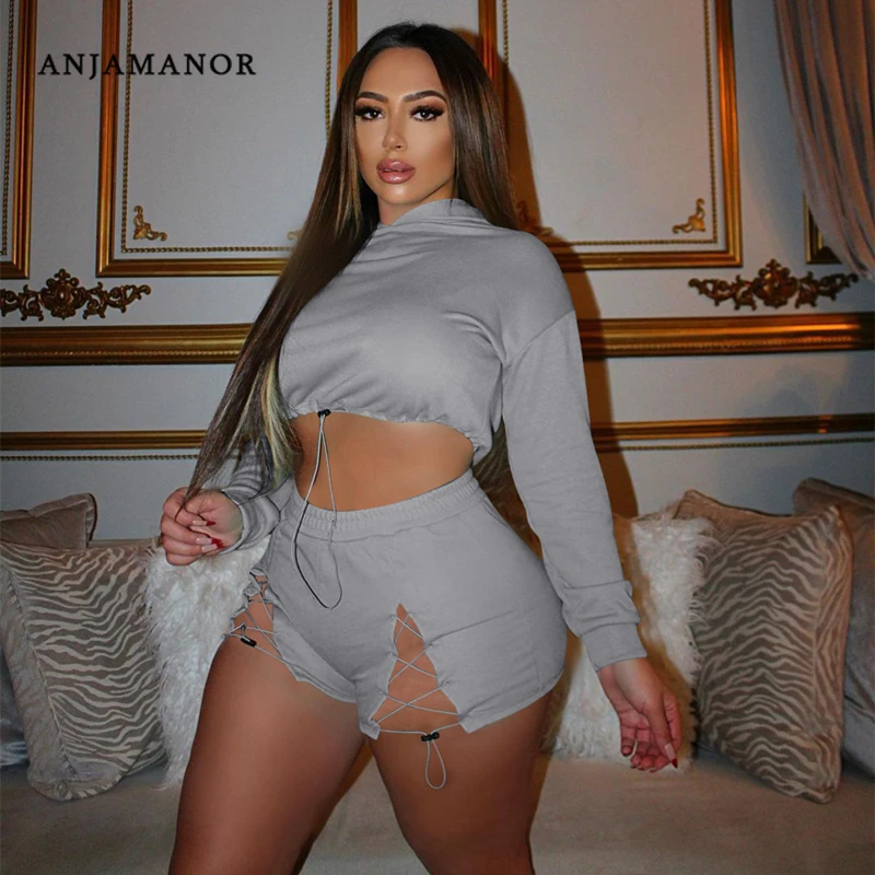 

ANJAMANOR Sexy Sporty Two Piece Set Long Sleeve Cropped Hoodie Cutout Sweat Shorts Sets Women Casual Tracksuit Wholesale D27CI38