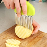 wave onion potato slices wrinkled french fries salad corrugated cutting chopped potato slices knife household kitchen supplies