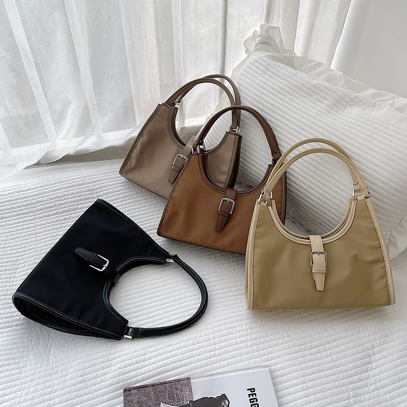 

Fashion Portable South Korea Women's Niche Fashion Solid Color Nylon Splicing Armpit Bag Simple And Stereotyped