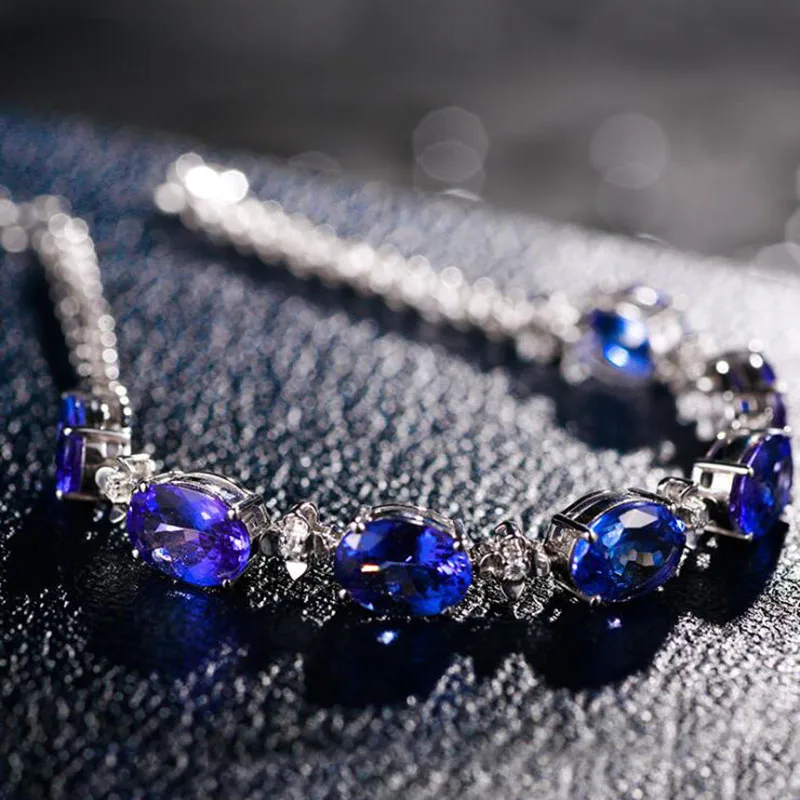 Женский браслет с овальным голубым драгоценным камнем | Украшения и аксессуары