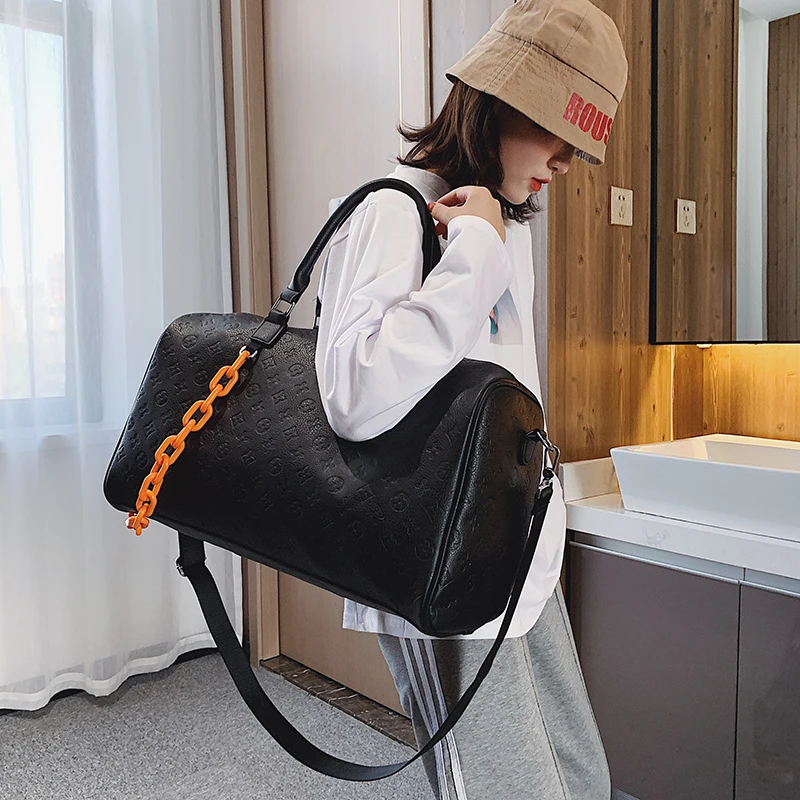 YILIAN Senior leather travelling bag for men and women large capacity portable casual fashion versatile shoulder