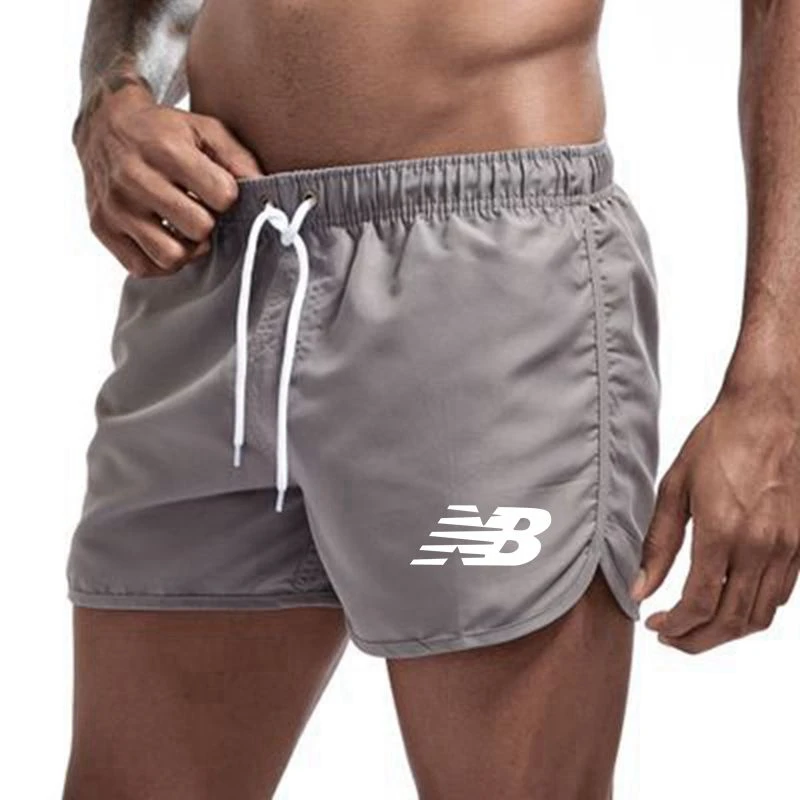 

Brand summer hot shorts NB men's shorts men's summer loose breathable casual shorts beach shorts plus size