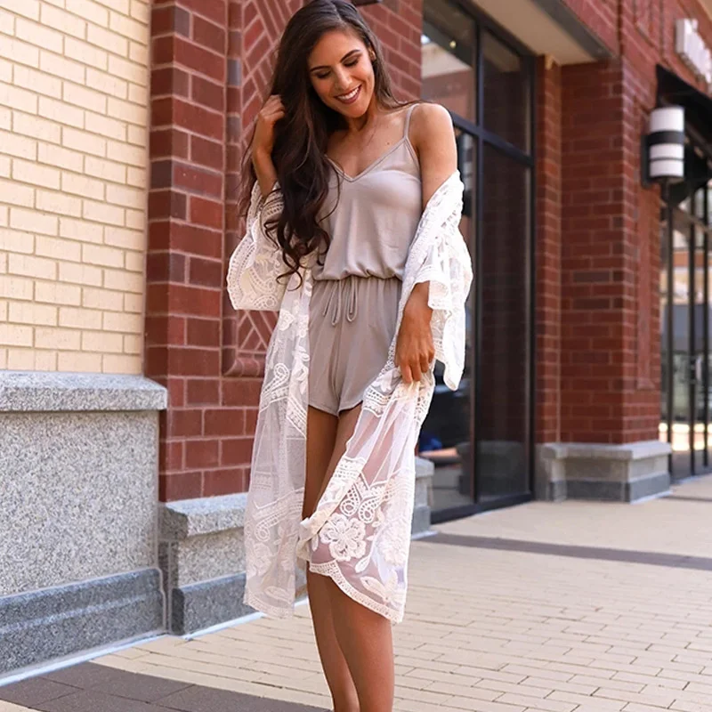 

New Lace Sexy cardigan beach skirt loose hot spring holiday cardigan bikini blouse sunscreen blouse