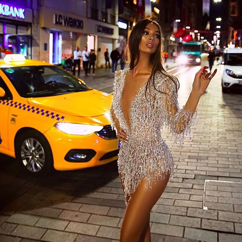 

VOLALO 2021 New Ladies Dress European and American Style Sexy Slim Lace Sequins Tassels Deep V-neck Fashion Woman Miniskirt