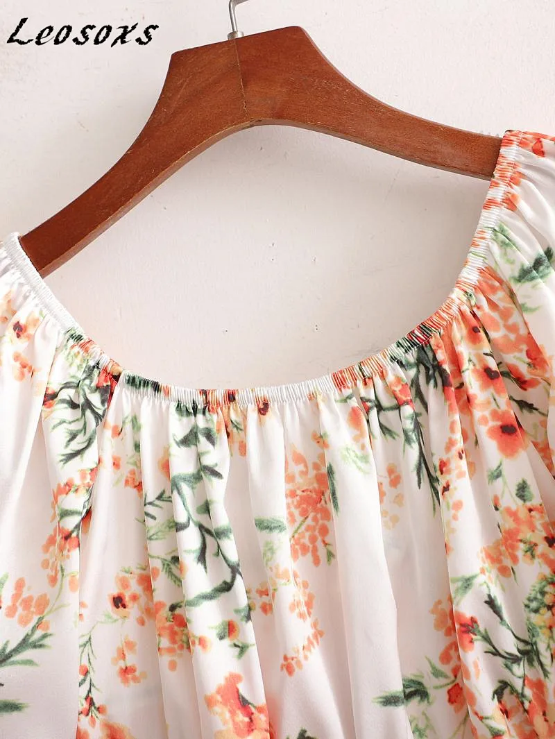 

Leosoxs Sexy Hollow Backless Floral Dress Women Resort Style Puff Sleeve Ruffle High waist bow elegant Dresses 2021 Summer New