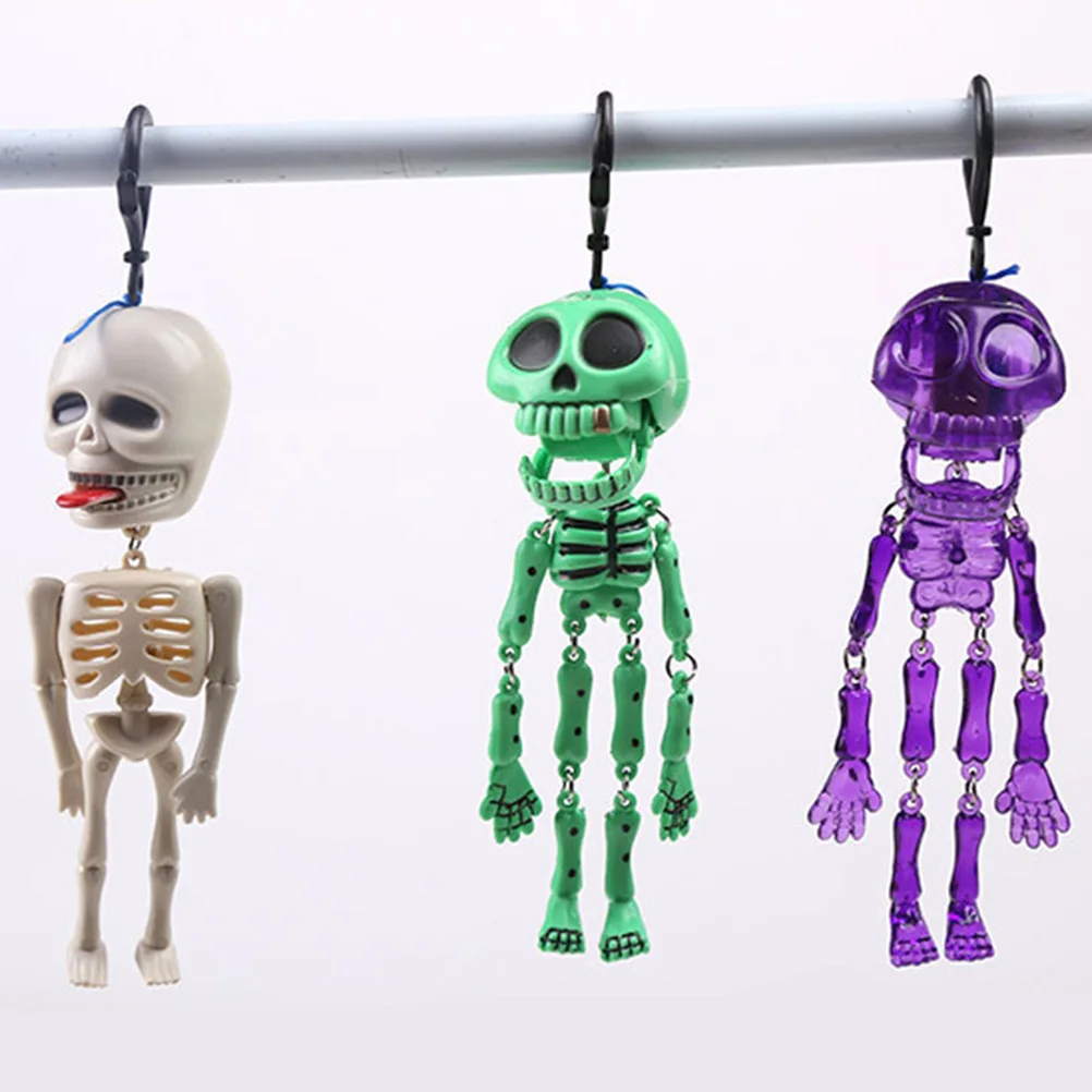 

2022 New Halloween Horror Glow-In-The-Dark Skeleton Spoof Toy Plastic Scary Fluorescent Small Skeleton Key Chain Pull Ghost