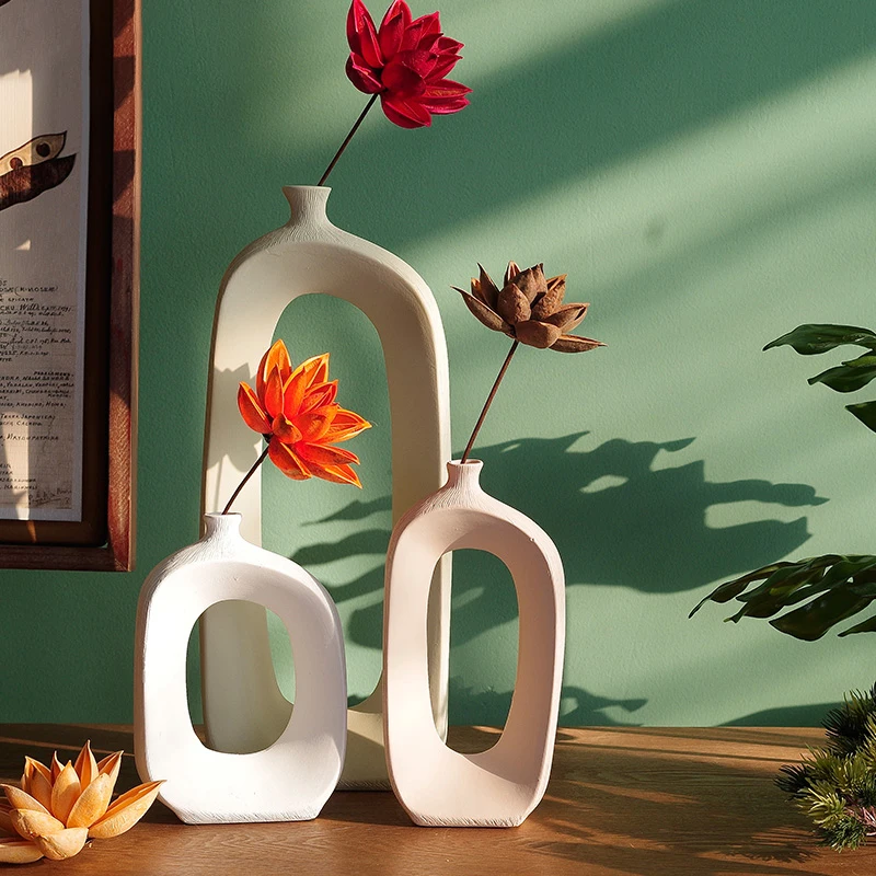 

Nordic simple ceramic stem flower Hollow vase Floral ornaments Home living room countertop decoration flower insert Creative