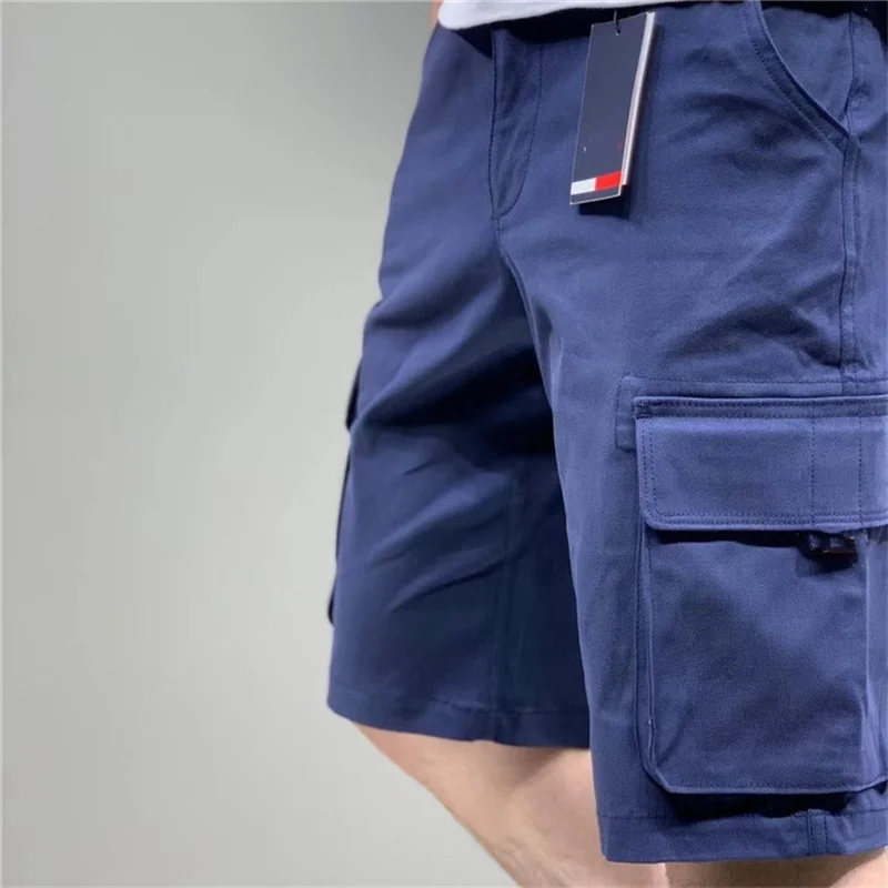 

21 summer new men's large embroidery letters leisure sports Multi Pocket solid color tooling shorts