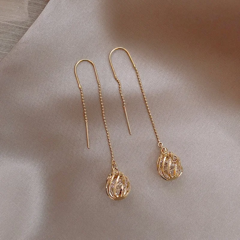 

Dominated Women Korean Long tassels metal hollow ball design fine crystal Drop earrings 2019 Classic style New earrings Jewelry