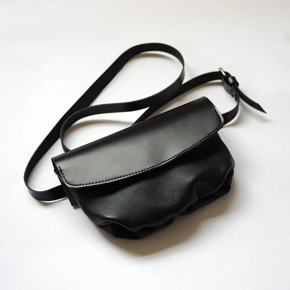 

Leather dumpling bag new ins Hong Kong style fashion all-match one-shoulder fold small crossbody bag cowhide chest bag black bag