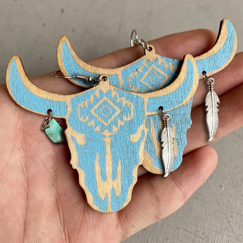 

Cowgirl Wooden Cow Head Dangle Earrings with Feather Turquoise Stone Colored Wood Steer Skull Aztec Earrings Western Jewelry
