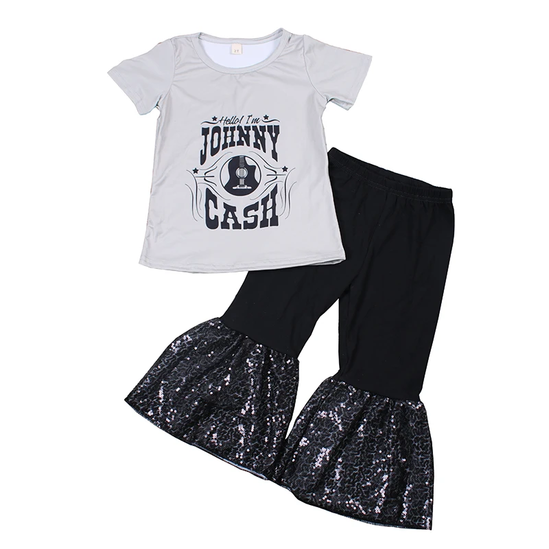 

Женский летний костюм с блестками и принтом певицы