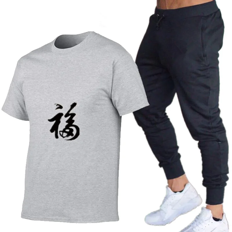 

Summer Printed Sportswear Men's suit Fitness Clothes Short-sleeved T-shirt Shorts New Fashion Two-Piece Breathable Shorts Suit