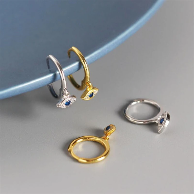 

Серьги-гвоздики женские из серебра 100% пробы с голубым Цирконом