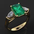 Кольцо женское из золота 14 карат, с зеленым изумрудом