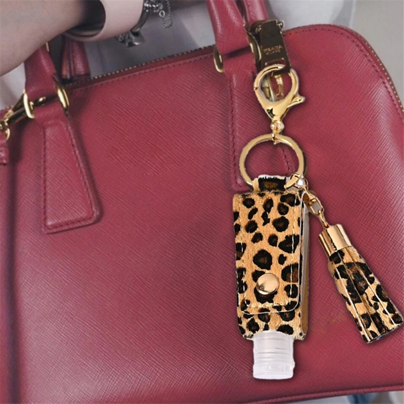 

30ml Portable Empty Leakproof Plastic Travel Bottle for Hand Sanitizer with Tassels Leather Keychain Holder Carriers
