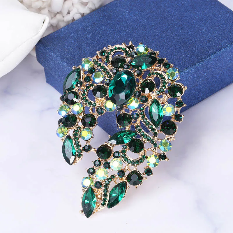 

Multiple Rhinestone Decoration Golden Metal Blue Opal Stone Eye Brooch Pin Women Party Jewelry Fashion Costume Accessories
