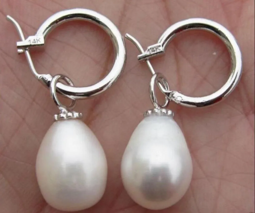 

charming pair of 11-12mm south sea baroque white pearl earring 14k