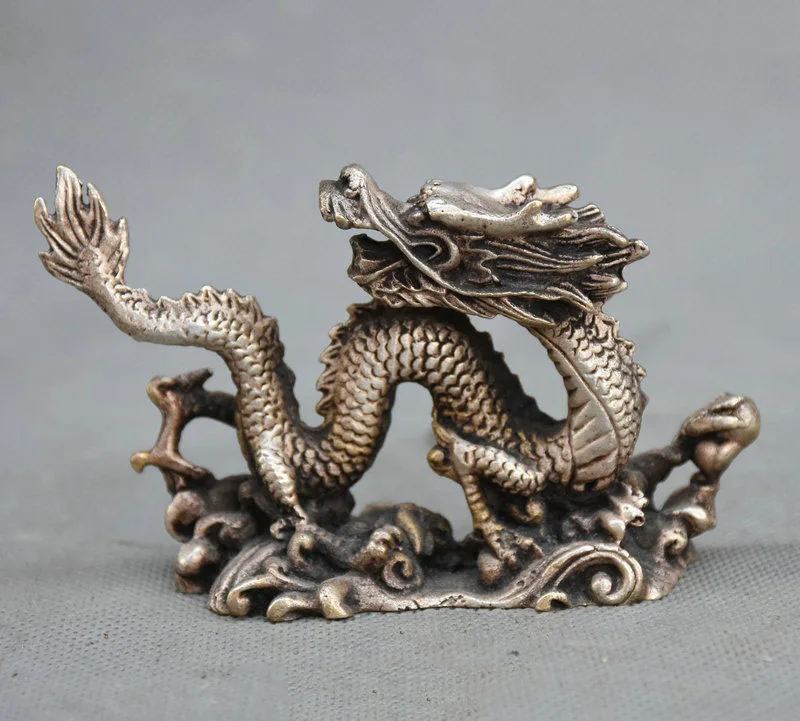 

Folk Chinese Fengshui Silver Carved Zodiac Year Dragon Play Ball Statue Figurine