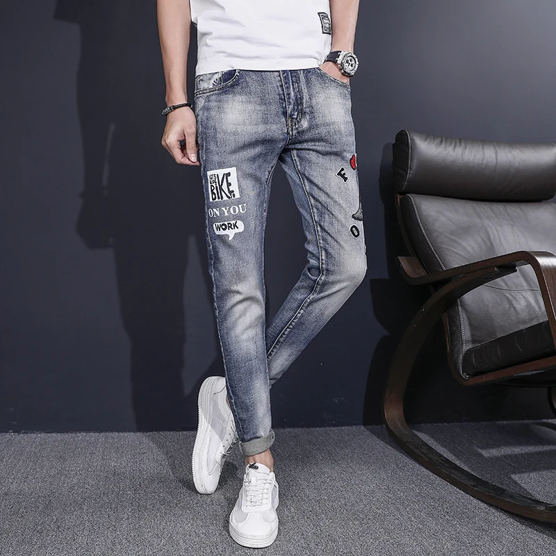 Весенние и осенние мужские джинсы с принтом в европейском американском стиле