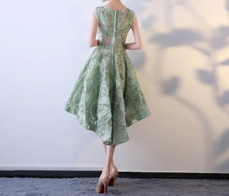 Светло-зеленое короткое спереди длинное сзади вечернее платье Элегантное