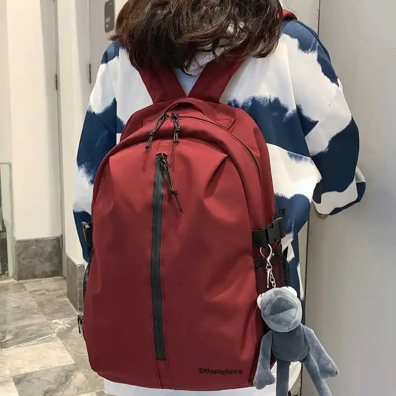 

Новый однотонный водонепроницаемый нейлоновый вместительный рюкзак унисекс с портативной вертикальной молнией рюкзак для колледжа