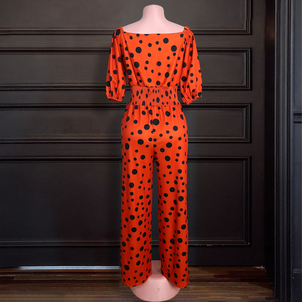 Женский комбинезон с открытыми плечами повседневный оранжевого и черного цвета