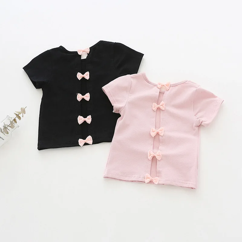 

Trend girl backless bow short-sleeved t-shirt summer new children's round neck cotton shirt foreign children's clothing