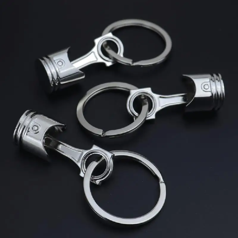 

Car Key Chain Zinc Alloy Engine Silvery Piston Key Ring Chain Keychain Key Fob Wholesale Silver Color For Men Gift Trinkets