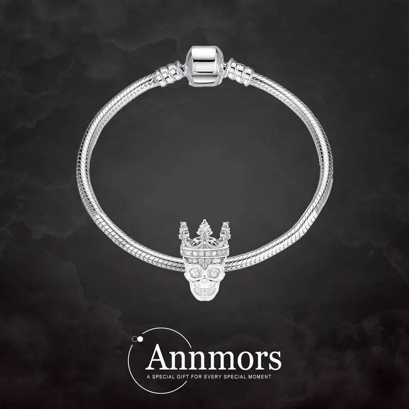 Подвеска в виде черепа с серебряной короной ювелирные изделия серебряным