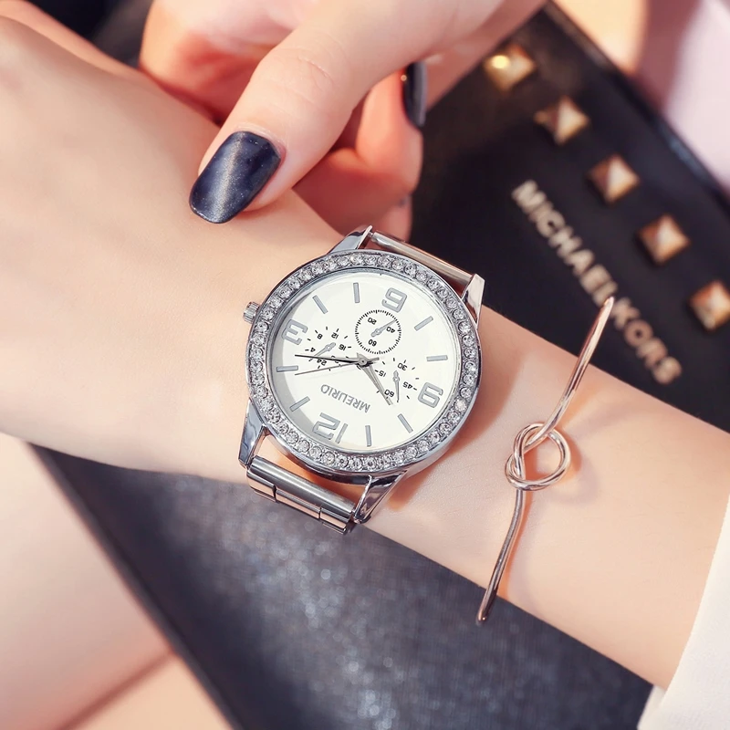 

New wholesale manufacturers export foreign trade fashion quartz Ladies Watch women's steel strap Gold Diamond large dial