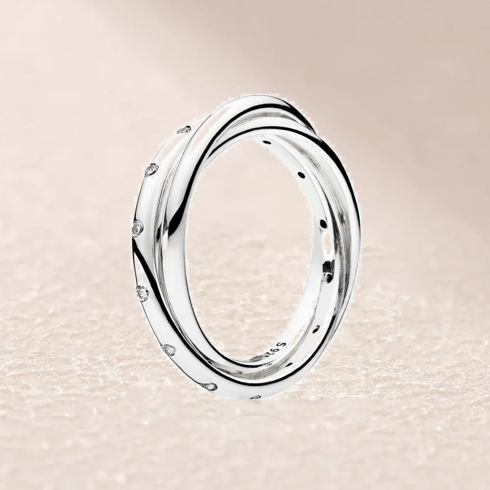 

191034CZ SWIRLING SYMMETRY RING