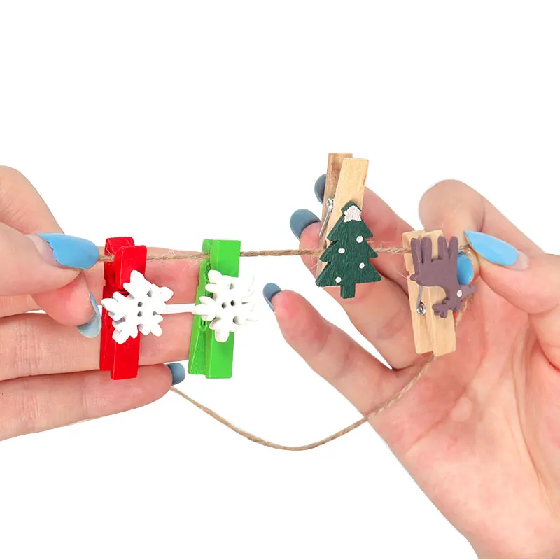 

CYUAN 20pcs Christmas Wooden Clothespins Mini Xmas Tree Snowflake Elk Gloves Photo Pegs Hanging Clips for Party Photo Clips DIY