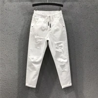 spring and summer new large size white jeans women loose wild casual nine points casual harlan daddy pants mother jeans