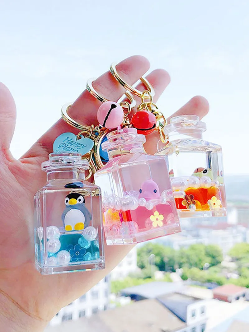 

1 piece of floating ocean doll key chain creative water world animal quicksand key chain bag pendant