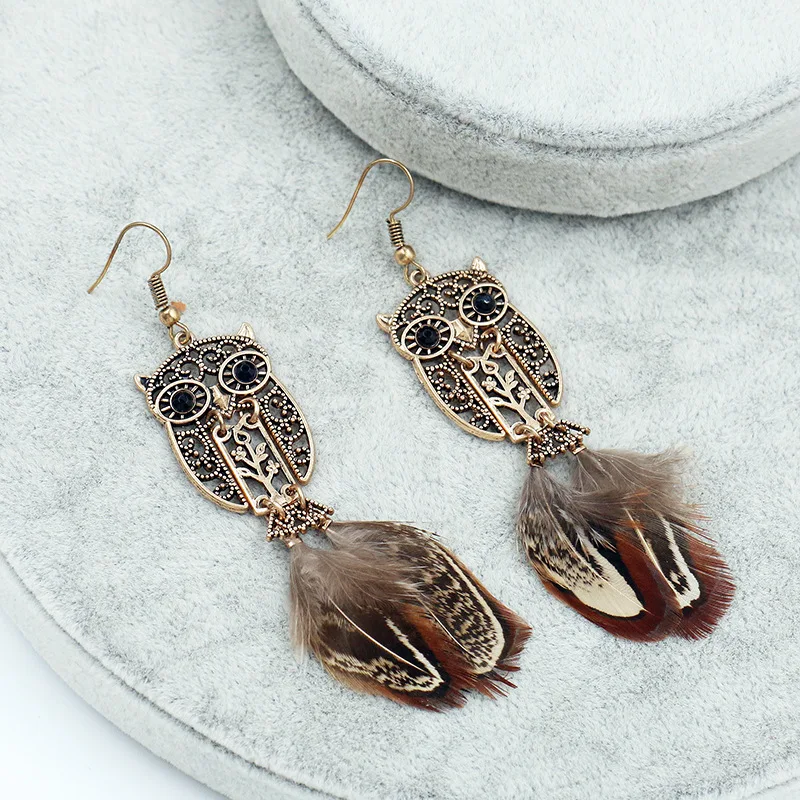 Женские длинные висячие серьги с перьями милые сияющими глазами в виде совы