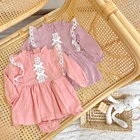 Детское хлопковое боди с длинным рукавом и кружевом